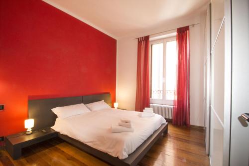 Postel nebo postele na pokoji v ubytování Casa Luino