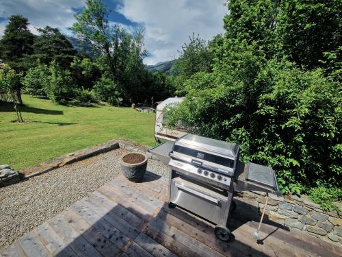 a barbecue grill sitting on top of a patio at WoodMood in Leuk