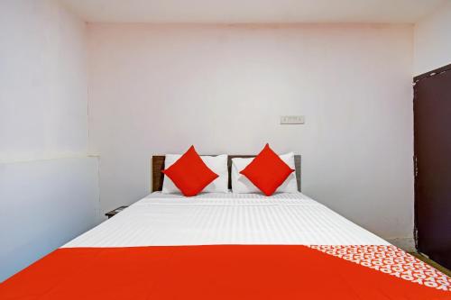 Katil atau katil-katil dalam bilik di Hotel O Relax Inn