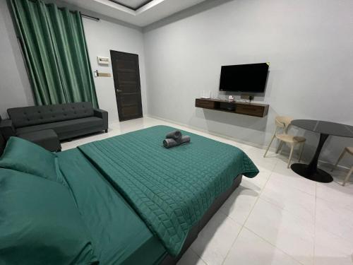 TV a/nebo společenská místnost v ubytování HMI Roomstay