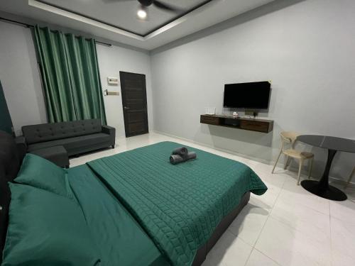 TV a/nebo společenská místnost v ubytování HMI Roomstay