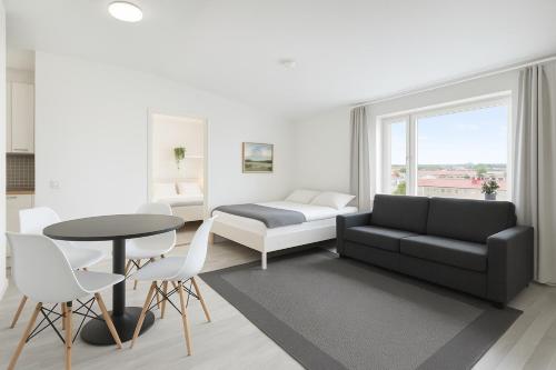 Postel nebo postele na pokoji v ubytování City Home Finland Penthouse – SAUNA & Best Location