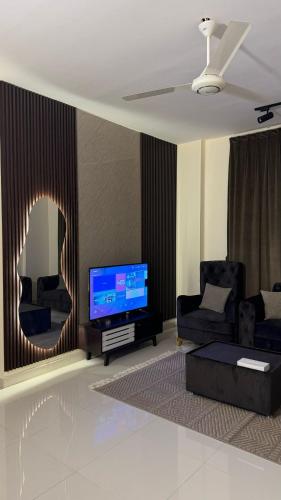 Hammed Apartment Seebにあるテレビまたはエンターテインメントセンター