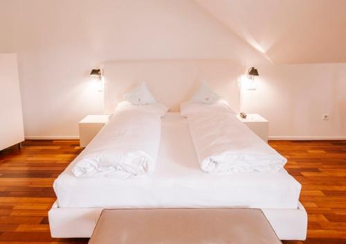 Postel nebo postele na pokoji v ubytování Seehotel Hubertushof
