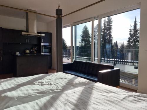 Ένα ή περισσότερα κρεβάτια σε δωμάτιο στο Stylische Penthouse Wohnung