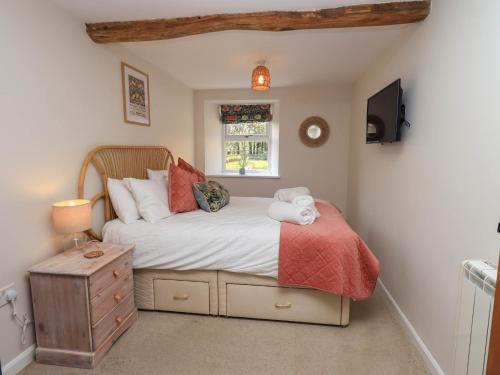 Postel nebo postele na pokoji v ubytování Corner Cottage