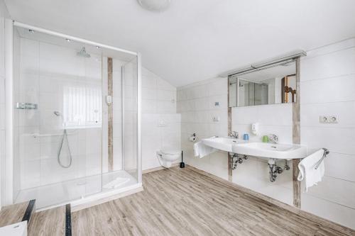Koupelna v ubytování Hotel Garni Nuss