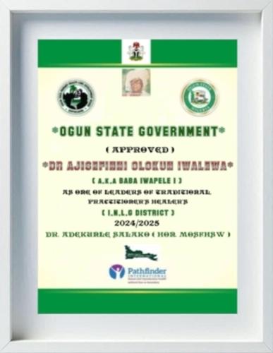a framed picture of a green and white certificate at The Real Powerful Spiritual Herbalist Man In Nigeria in Ijebu Igbo