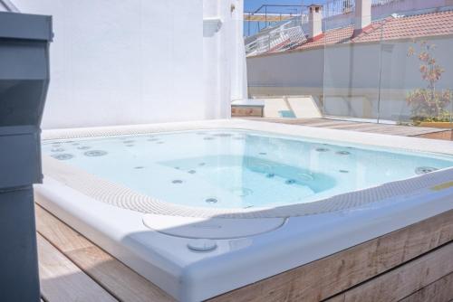 Honest Sevilla Apartments photo 23
