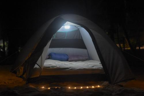 Postel nebo postele na pokoji v ubytování Camping Naka