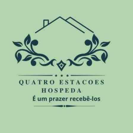 a logo for a hospital with a graduation cap at Star Green 211 - Triplex com linda vista e ótima localização in Campos do Jordão