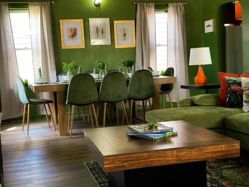 a living room with a couch and a table at Condo 2bd2bagrilllaundry-10pp-pet Friendly in Russell