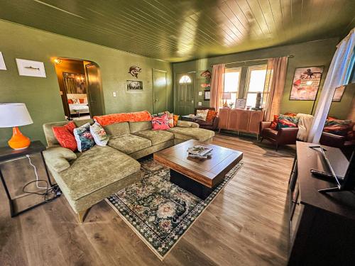 a living room with a couch and a coffee table at Condo 2bd2bagrilllaundry-10pp-pet Friendly in Russell