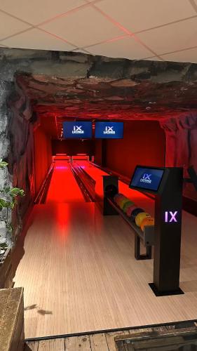 a bowling alley with a lane in a tunnel at Touch of Yellow in Gramsbergen