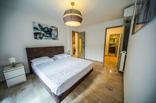 Katil atau katil-katil dalam bilik di Stylish apartment in the center of Avignon