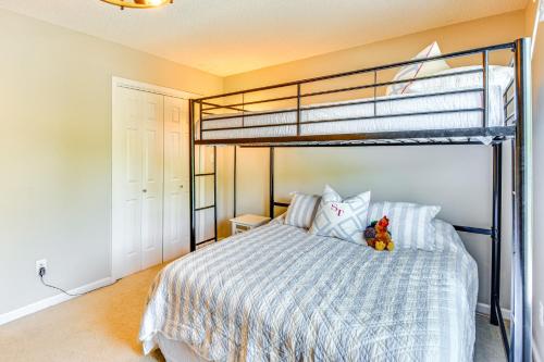 a bedroom with a bed with a bunk bed at 7 Mi to Clemson Stadiums Lake Keowee Getaway! in Seneca