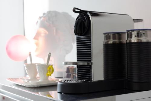 a coffee maker sitting on top of a counter at Suite Sole Praiano in Praiano