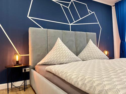 a bedroom with a bed with a large spider headboard at MD Apartments Stuttgart Zuffenhausen in Stuttgart