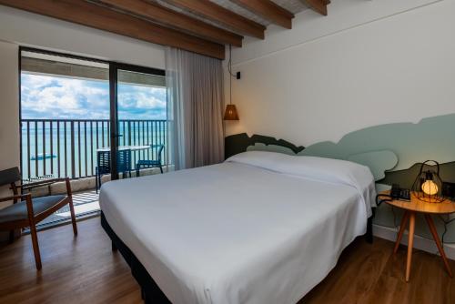 Una cama o camas en una habitación de Ibis Styles Maragogi - O primeiro Ibis Styles pé na areia do Brasil