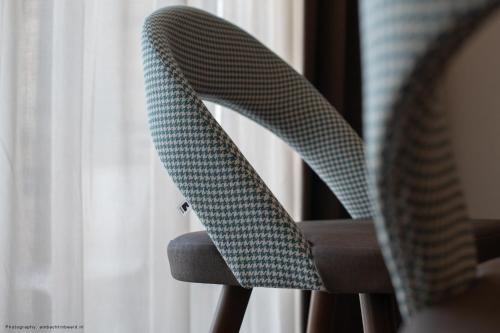 a close up of the back of a chair at Hotel Philippe Suites I Kloeg Collection in Philippine