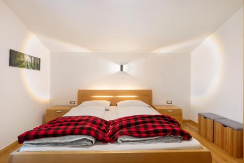Ένα ή περισσότερα κρεβάτια σε δωμάτιο στο Ferienhaus Leitner