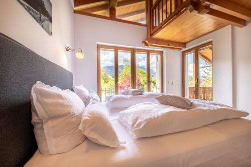 En eller flere senge i et værelse på Haus am Leitenfeld