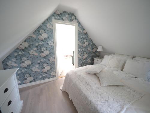 Postel nebo postele na pokoji v ubytování Villa Svanviken
