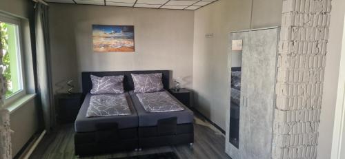Postel nebo postele na pokoji v ubytování M&R Motel