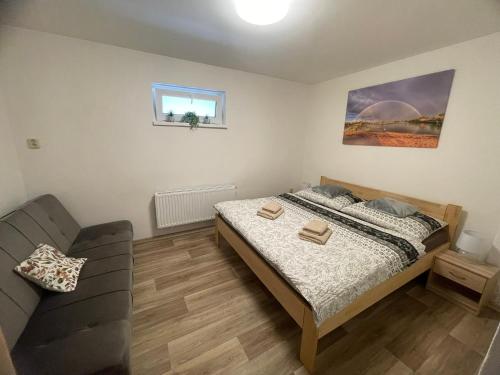 Postel nebo postele na pokoji v ubytování Apartmán u Dejva Zaječí