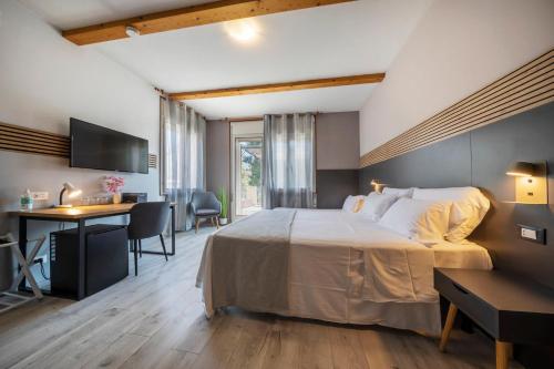 Postel nebo postele na pokoji v ubytování Bed & Bike Feltre