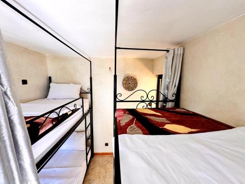 Cama o camas de una habitación en Atlas Hostel Taghazout