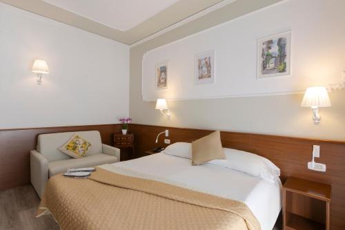 Hotel Central Wellnessにあるベッド