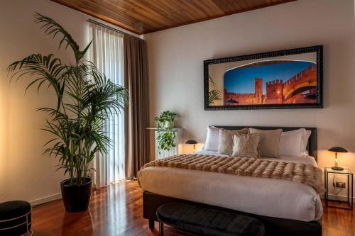 Letto o letti in una camera di PALAZZO RISTORI