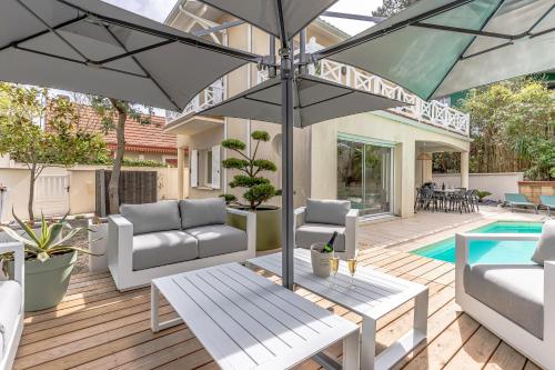 Villa Fleurs des Pins, piscine chauffée , 80 m de la plage Pereire