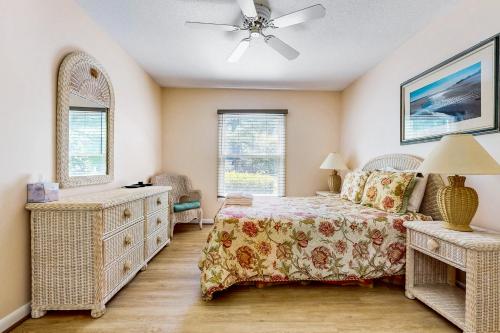 a bedroom with a bed and a ceiling fan at Sea Colony --- 16004 Bayberry Court in Bethany Beach