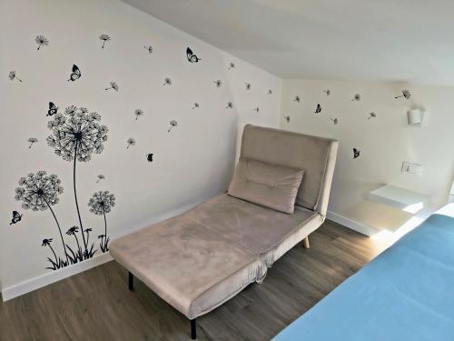 Giường trong phòng chung tại Mansarda tra le stelle a Locana