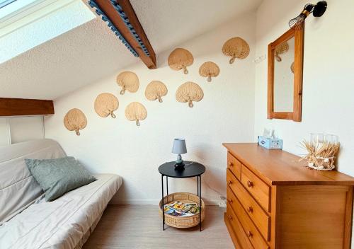 En eller flere senge i et værelse på Duplex la Baleine Bleue