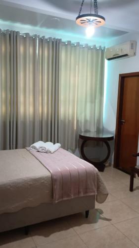Postel nebo postele na pokoji v ubytování Apartamento 102 espaçoso e tranquilo