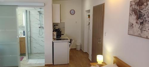 Ένα μπάνιο στο Apartman Alaga D