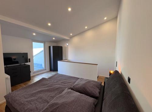 Katil atau katil-katil dalam bilik di Ferienwohnung Kürenzer Auszeit