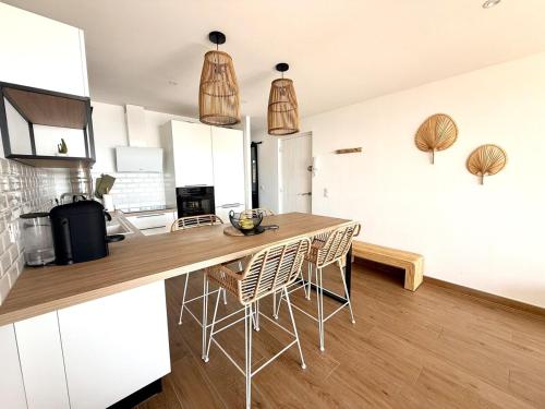 Appt bord de mer,Clim & parking