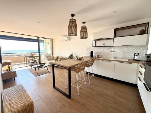 Appt bord de mer,Clim & parking