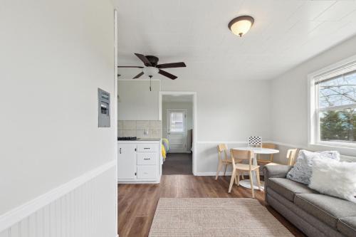 a living room and kitchen with a couch and a table at Pleasant Valley Resort in Arcadia