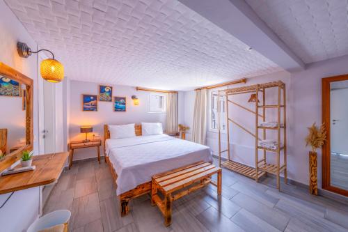 Postel nebo postele na pokoji v ubytování Larex Otel
