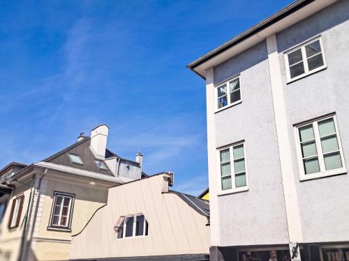 a building with a blue sky in the background at Apartment Siebter Himmel by Interhome in Bad Ischl