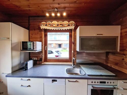 Η κουζίνα ή μικρή κουζίνα στο Holiday Home Sonnenplatzl Verditz by Interhome