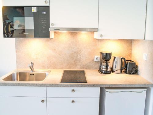 Η κουζίνα ή μικρή κουζίνα στο Apartment Tossens-10 by Interhome