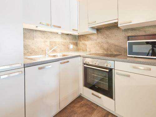 Η κουζίνα ή μικρή κουζίνα στο Apartment Pinsons by Interhome