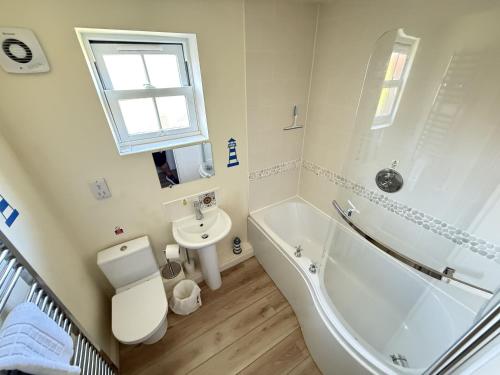 Ένα μπάνιο στο Lighthouse Apartment