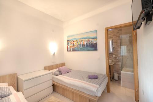 Postel nebo postele na pokoji v ubytování Luxury Apartment Aria
